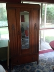 Lot's of good stuff -old Armoire,game of thrones DVD