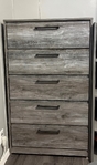 Modern farmhouse gray wood style bedroom set.