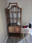 Wicker stand with glass shelves