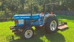 Ford Model 1910 Tractor with brush hog and box blade.