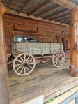 Antique wagon john deere with seed spreader