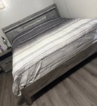 Modern farmhouse gray wood style bedroom set.