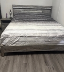 Modern farmhouse gray wood style bedroom set.